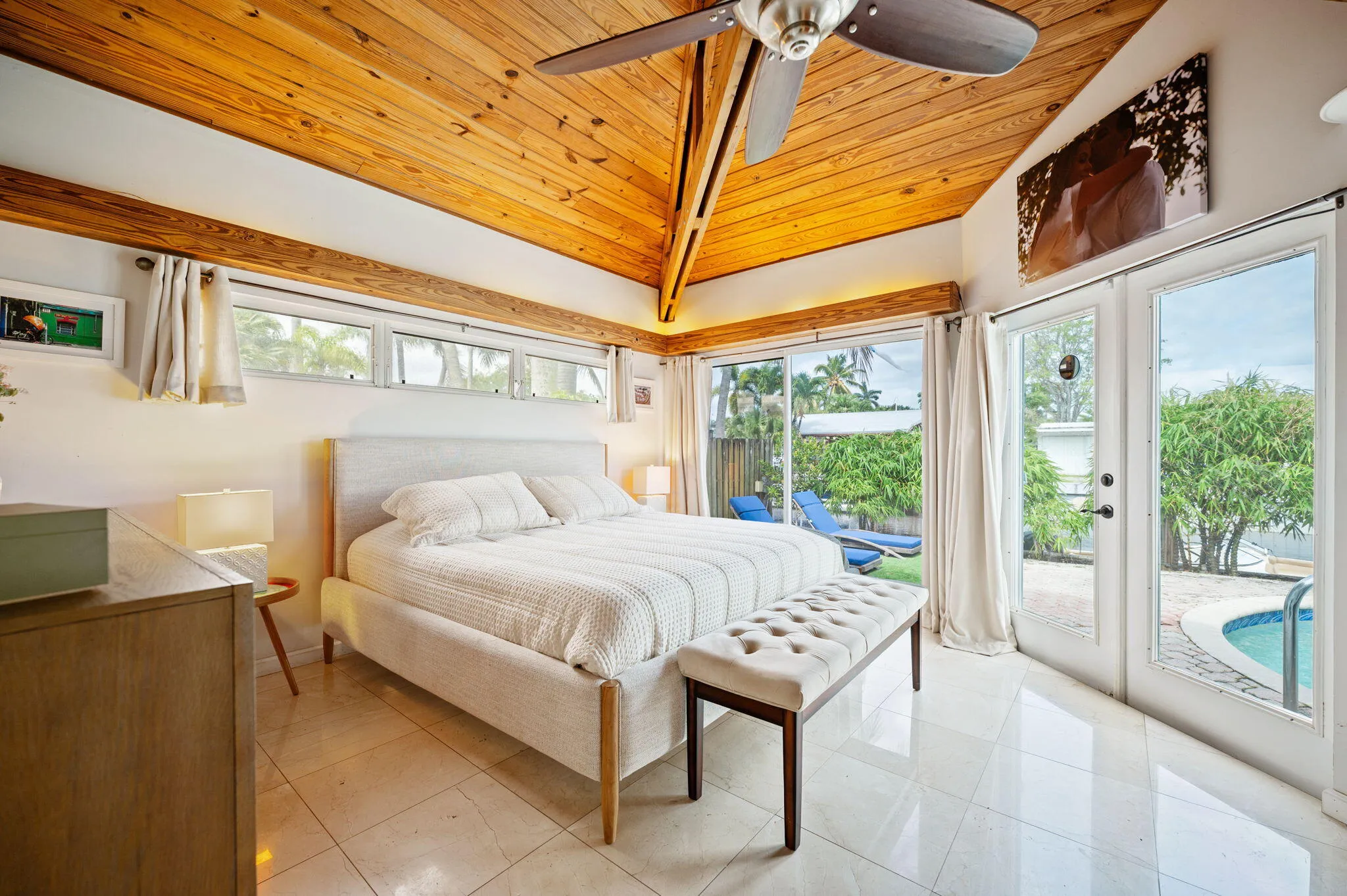 Primary suite with gorgeous ceilings, a walk-in closet, a second closet and bathroom.
