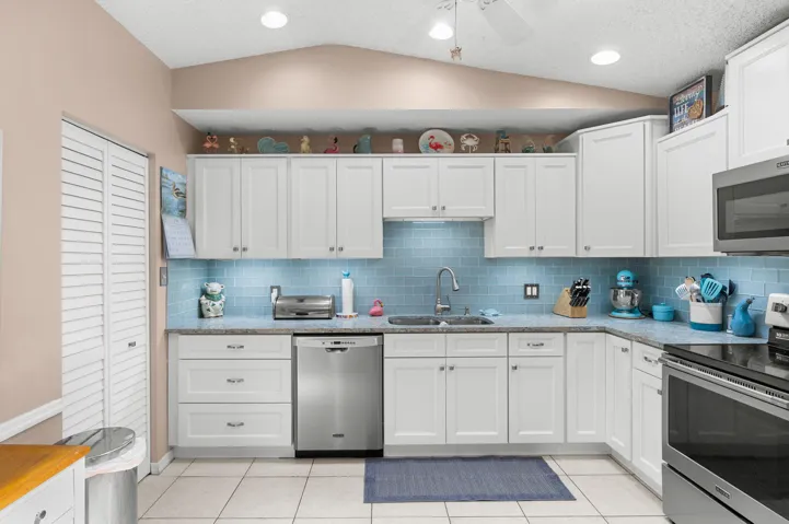 Beautifully updated kitchen with stunning quartz countertops