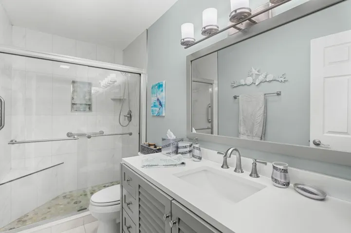 Tastefully updated w/large vanity and walk-in shower