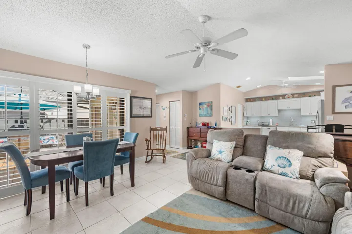 Bright, open living area with plantation shutters