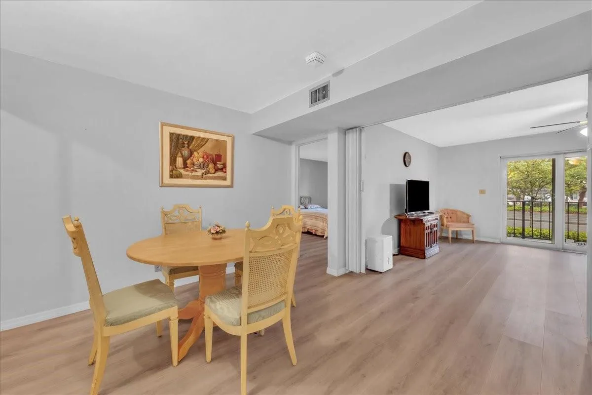 open layout, Fort Lauderdale condo interior, spacious dining room, light and bright living area, modern condo design, coastal Florida home