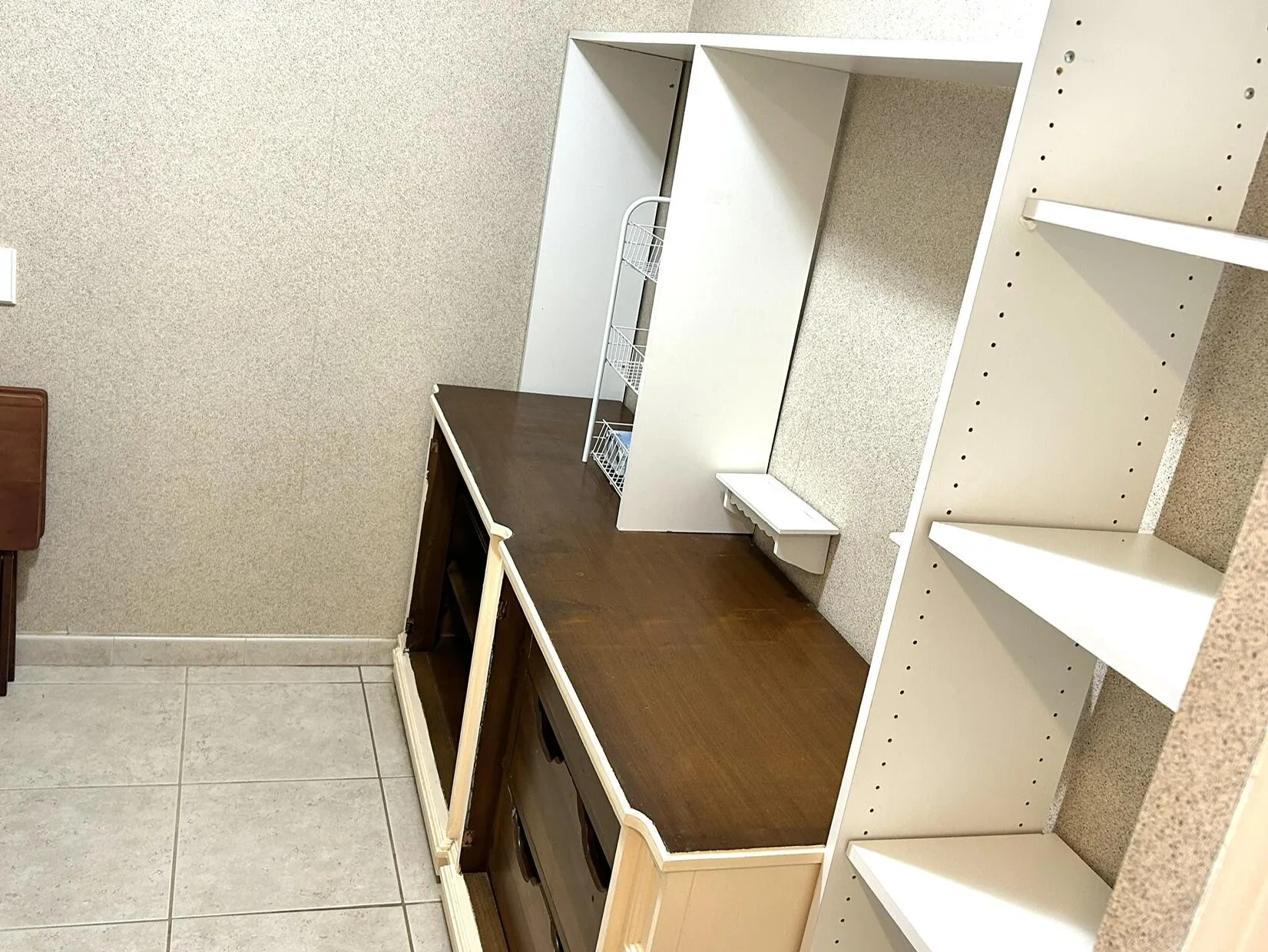 Big walk in closet includes built ins.