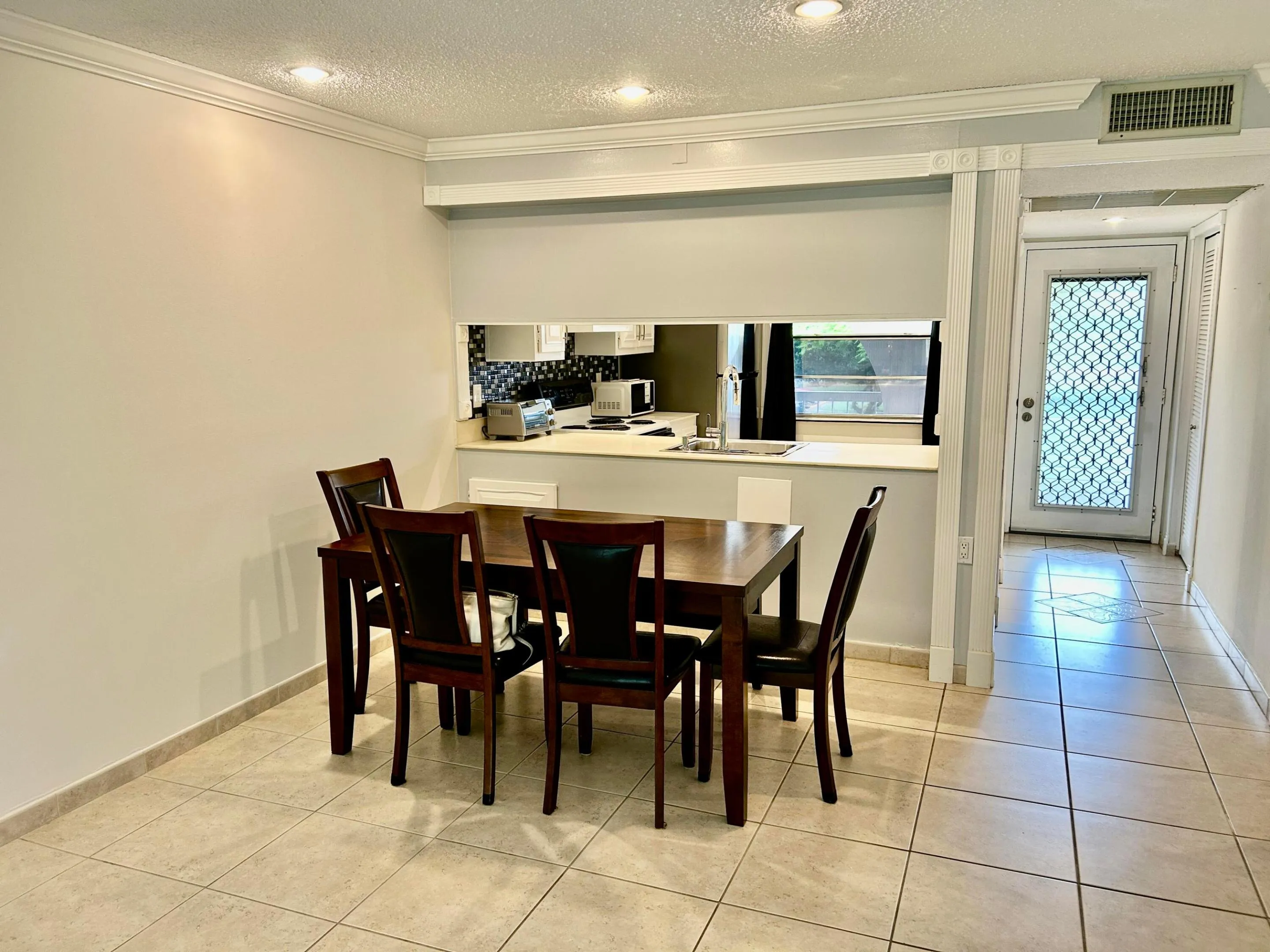 Dining area and kitchen pass through.