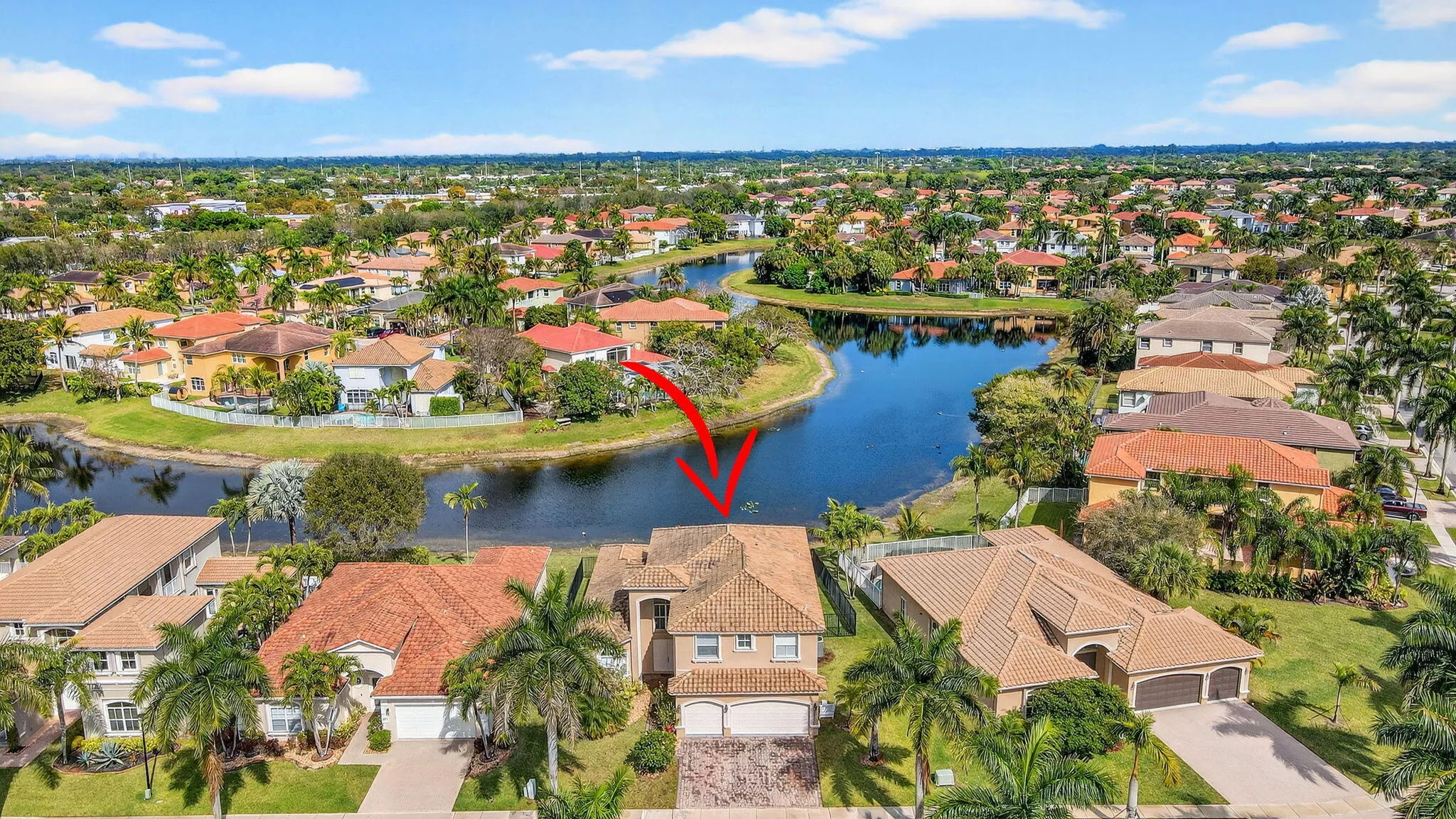 Lakefront home with fully fenced yard