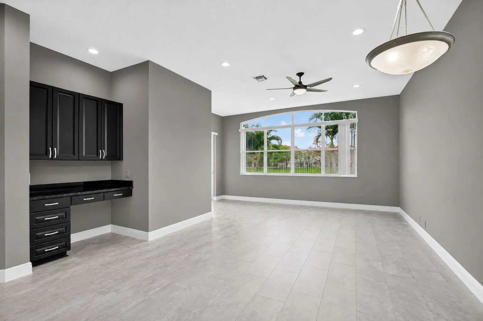 Built-in desk between kitchen and family room