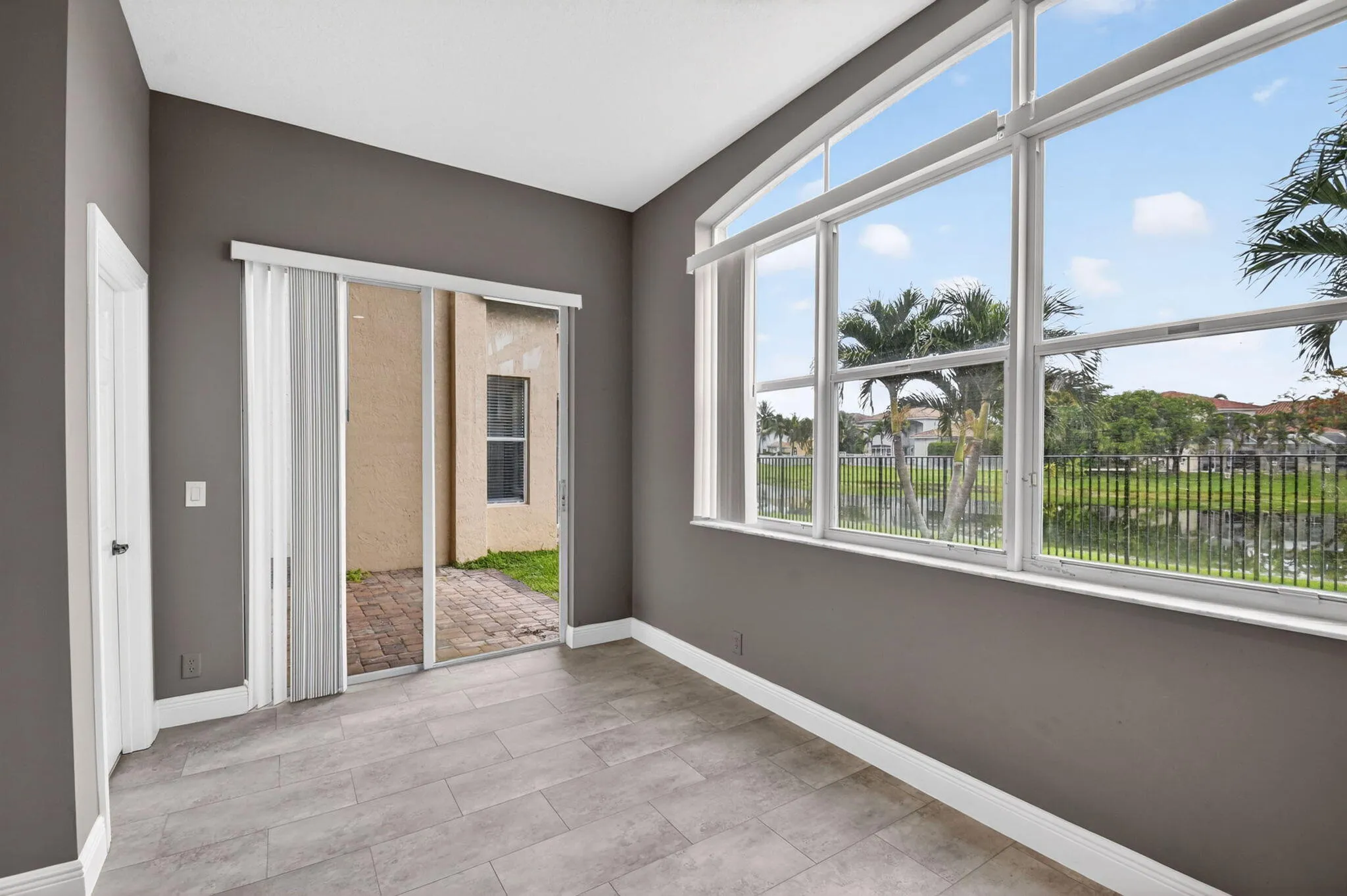 Family room slider to patio and half bath to the left