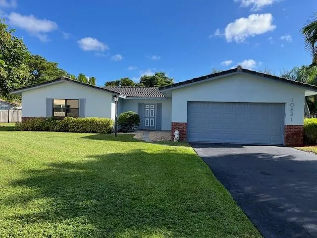FRONT VIEW-LONG DRIVEWAY