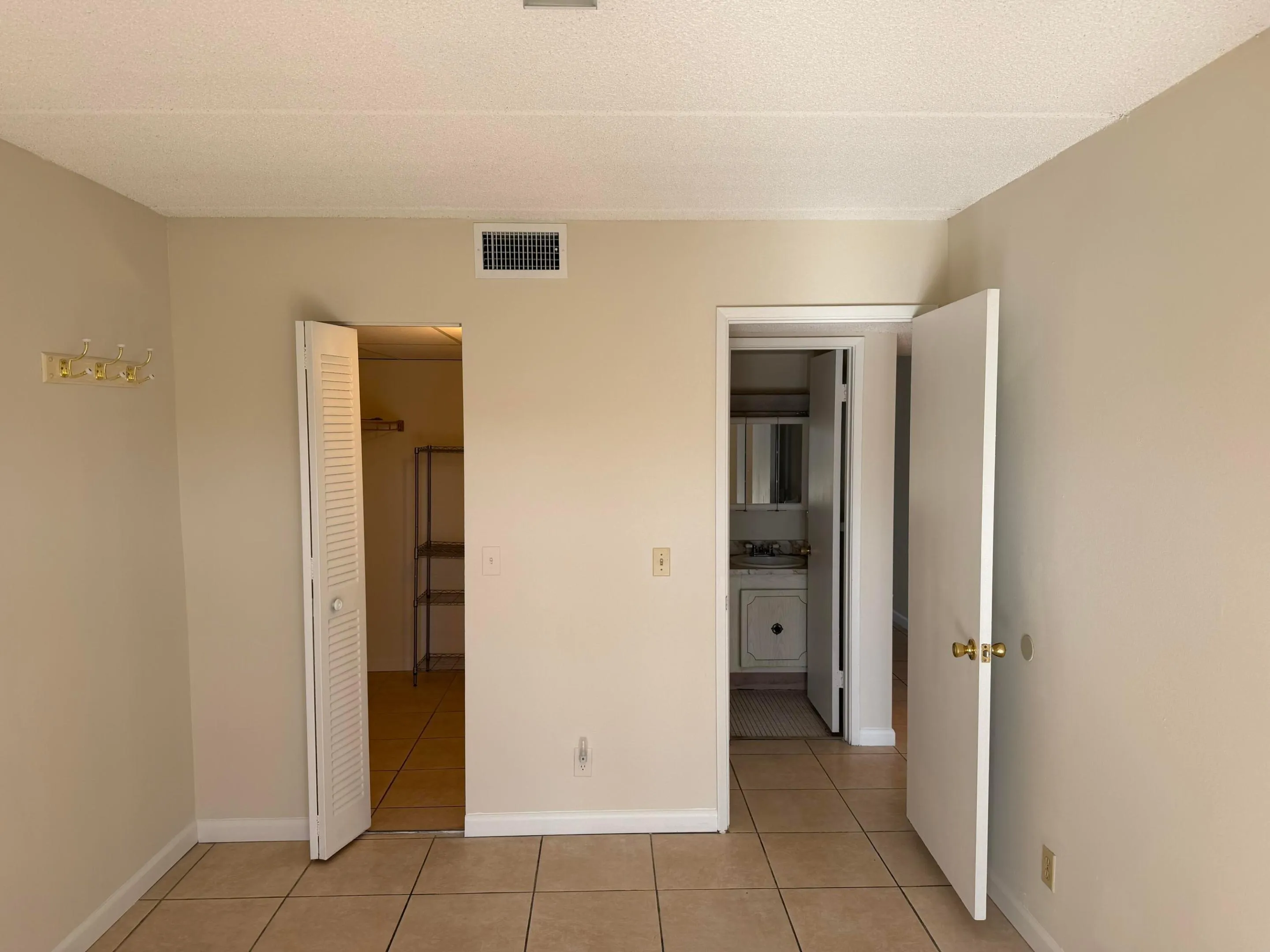 Main bedroom has half bath and walk-in closet