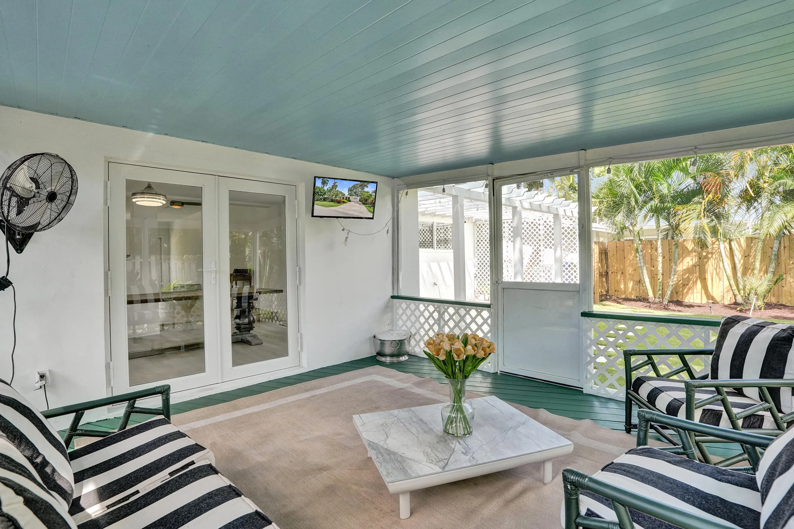 Screened patio. Dining room doorway.