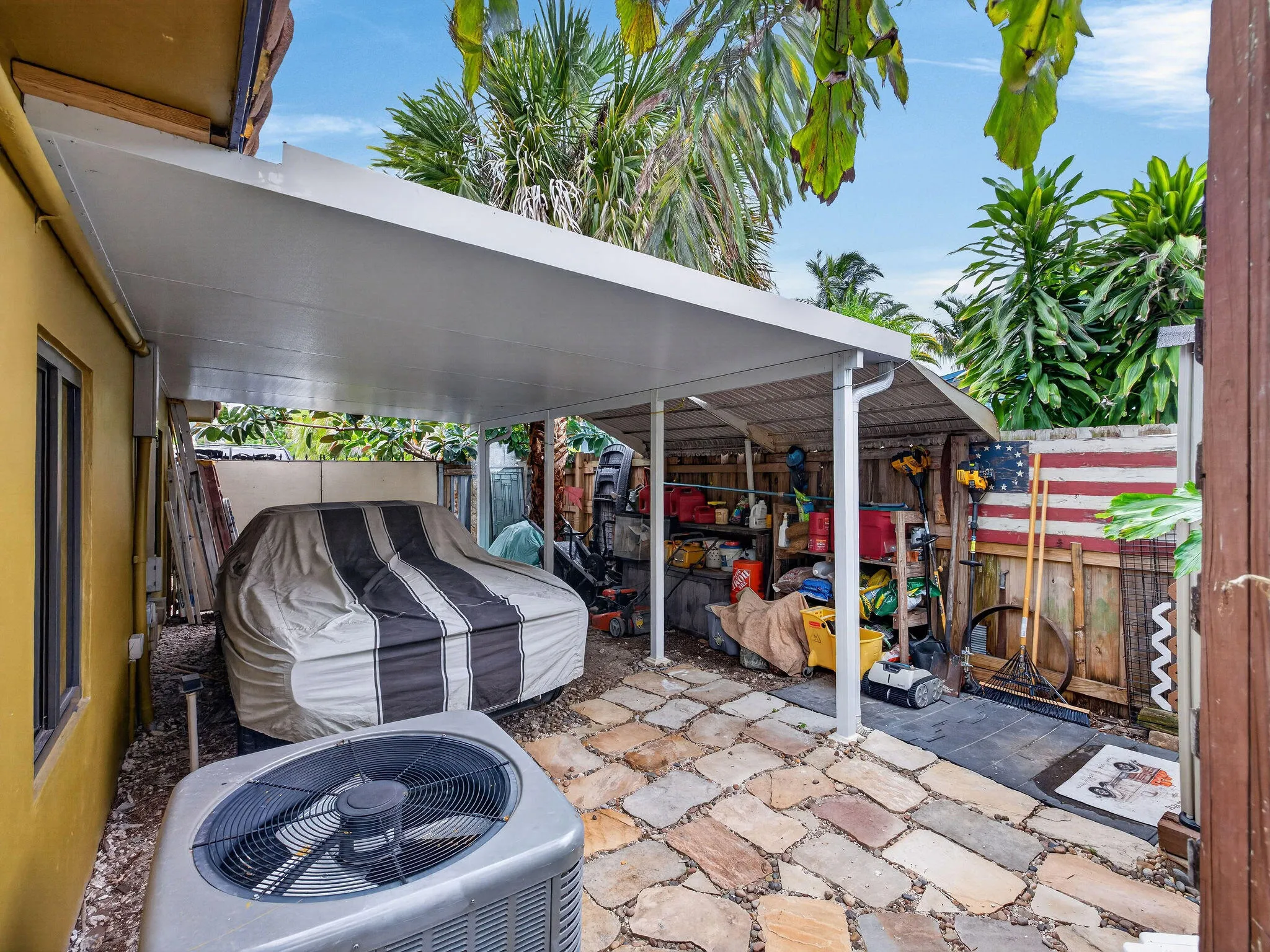 Covered Carport and Storage Area