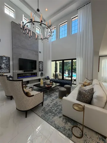 BEAUTIFUL HIGH WINDOWS SURROUND THIS GREAT ROOM, PROVIDING GREAT LIGHT THROUGHOUT.