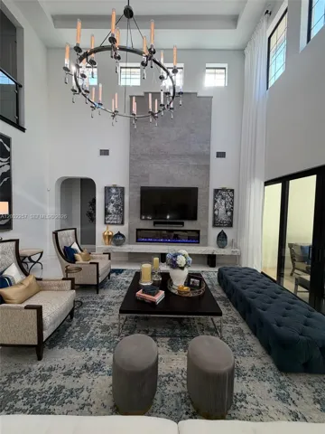 GREAT ROOM HAS CUSTOM SURROUND SOUND SYSTEM INSTALLED.