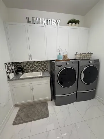 LAUNDRY ROOM ON FIRST FLOOR