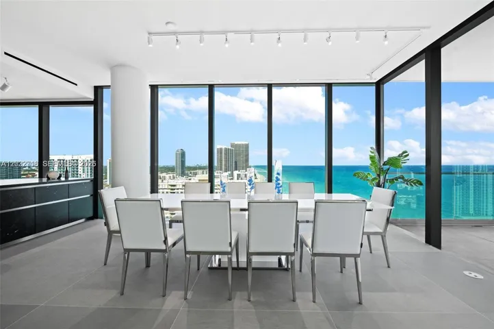 Direct ocean views from the spacious ldining area with floor-to-ceiling glass.