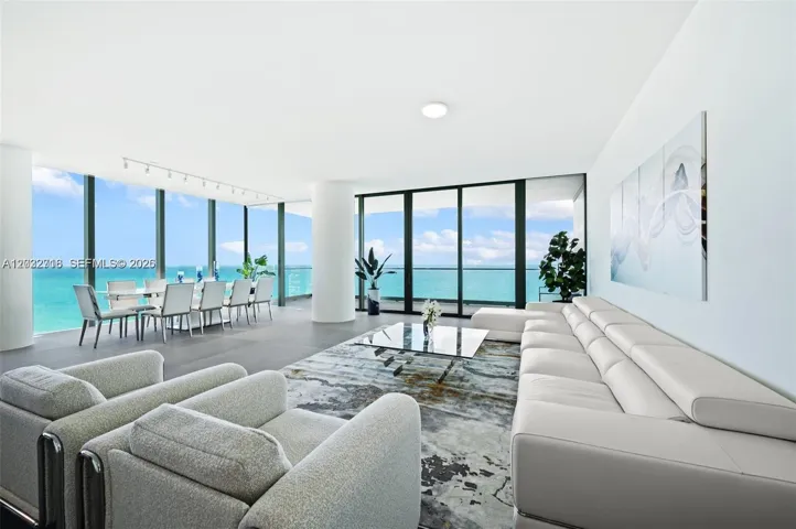 Direct ocean views from the spacious living area with floor-to-ceiling glass.