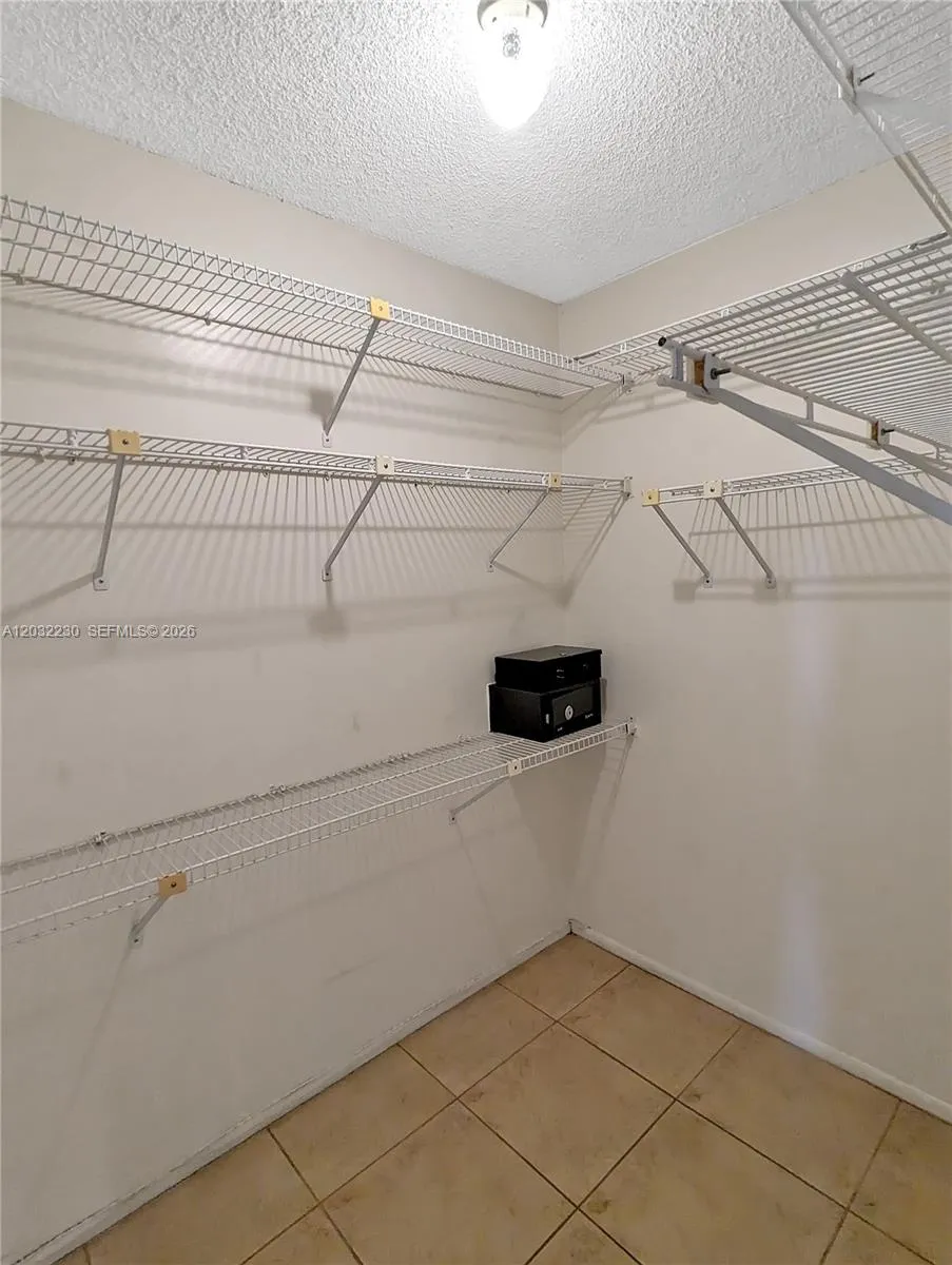 Primary Bedroom Walk-In Closet