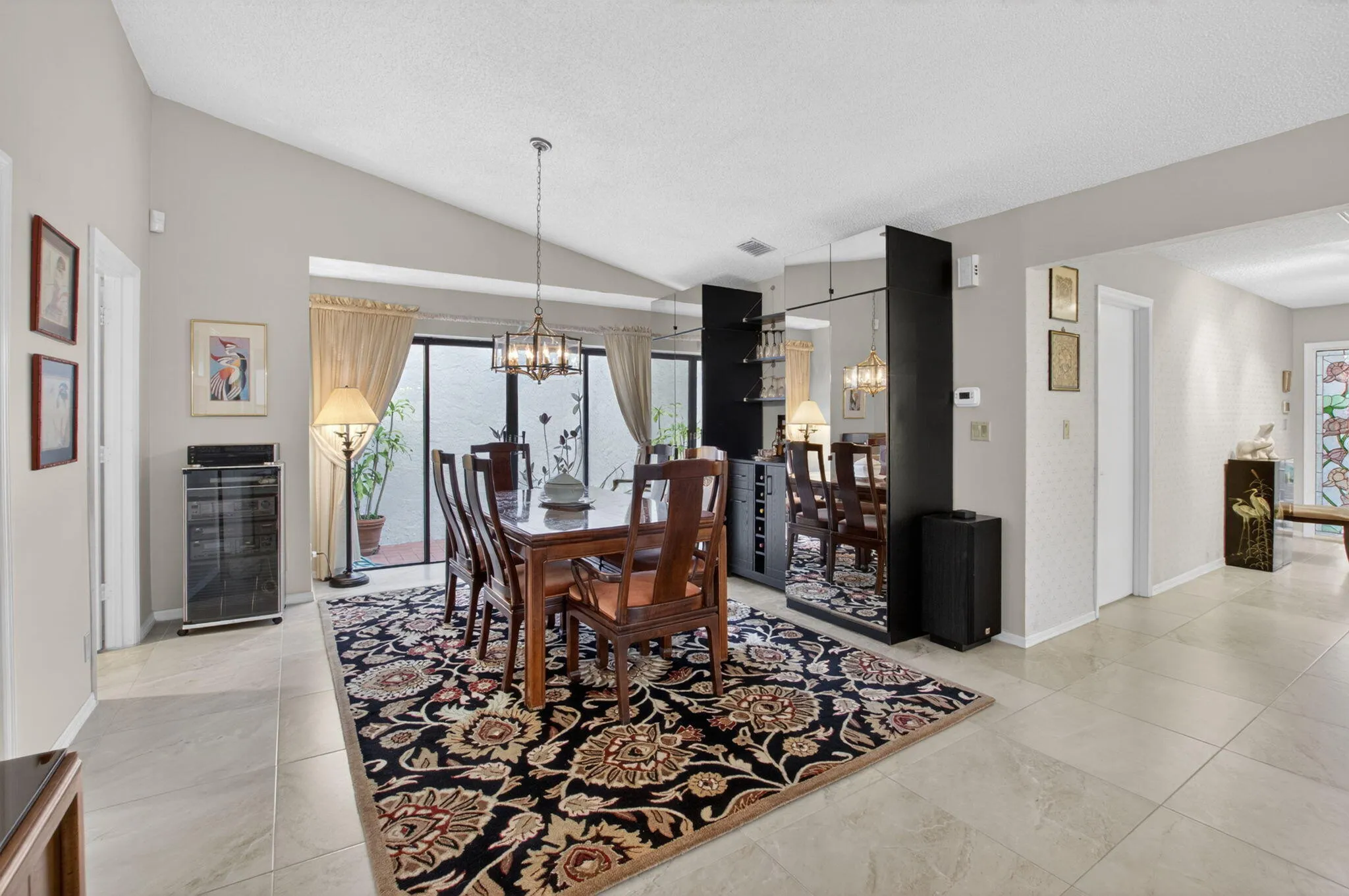 Large Dining Room with side patio.