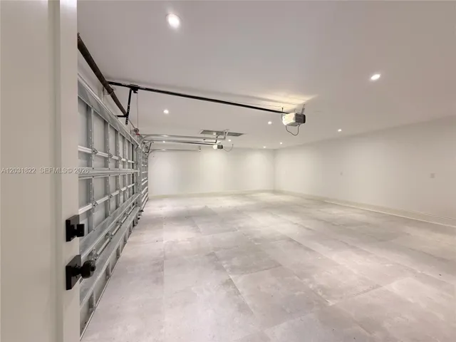 3 CAR GARAGE WITH TILE