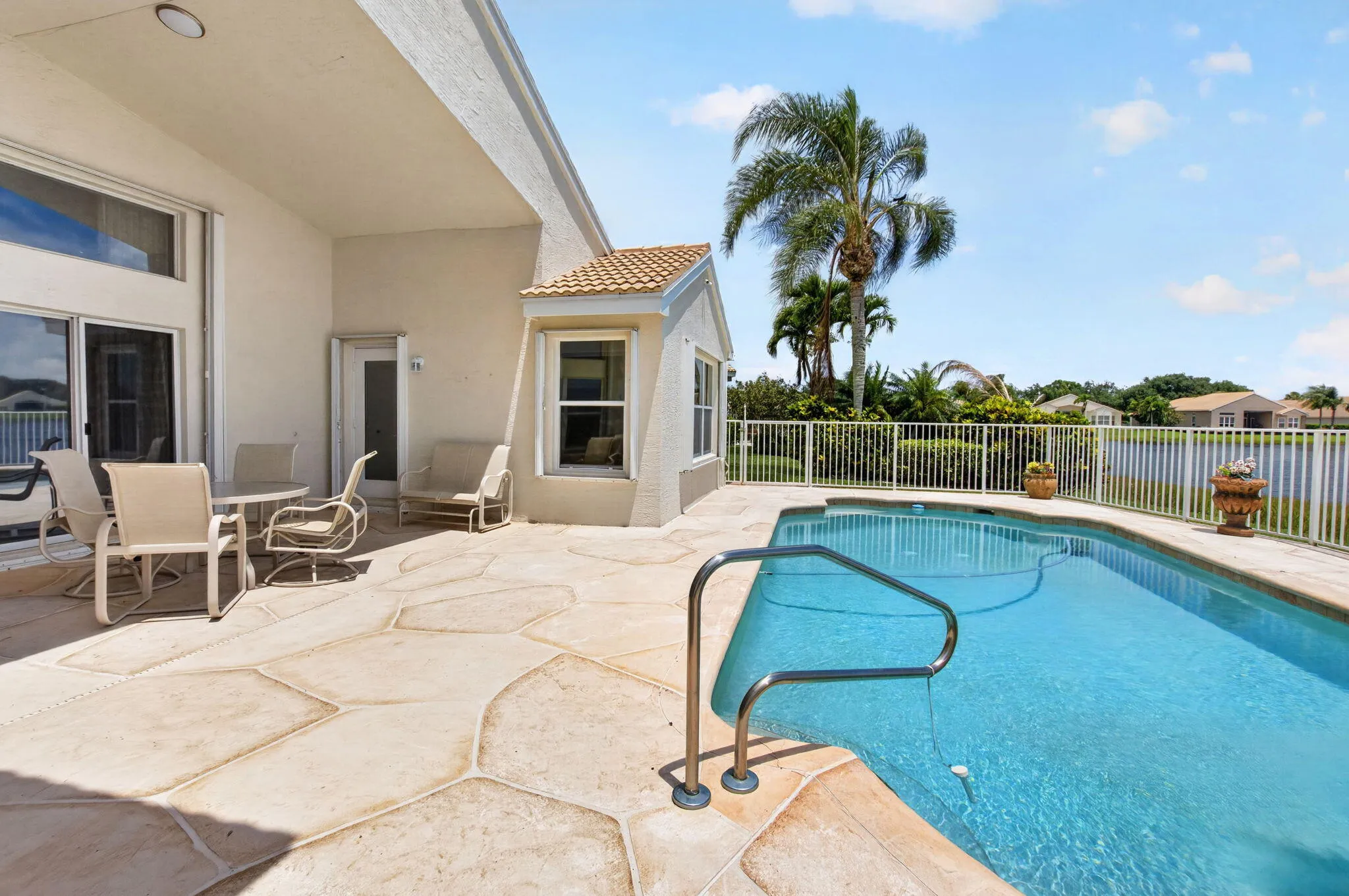 COVERED LANAI POOL/SPA OVERLOOKING LAKE