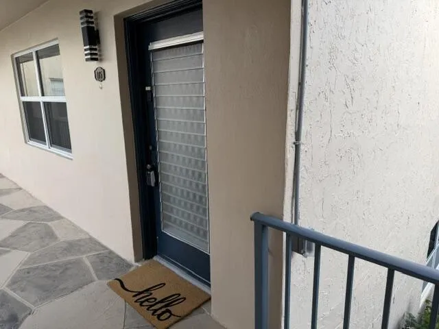 Front door on second story breezeway.