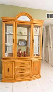 China cabinet included in dining area.
