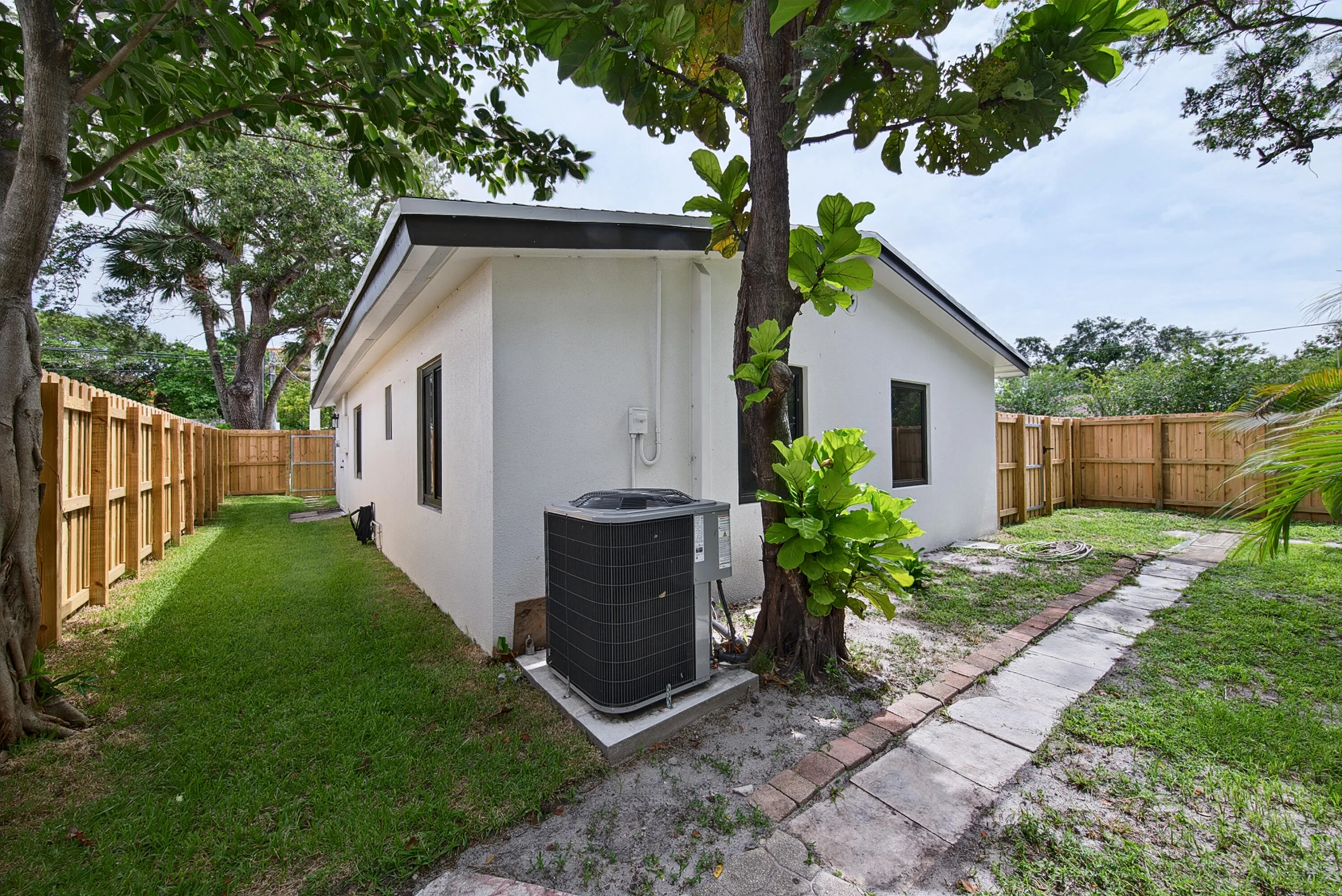 View from large side yard into backyard