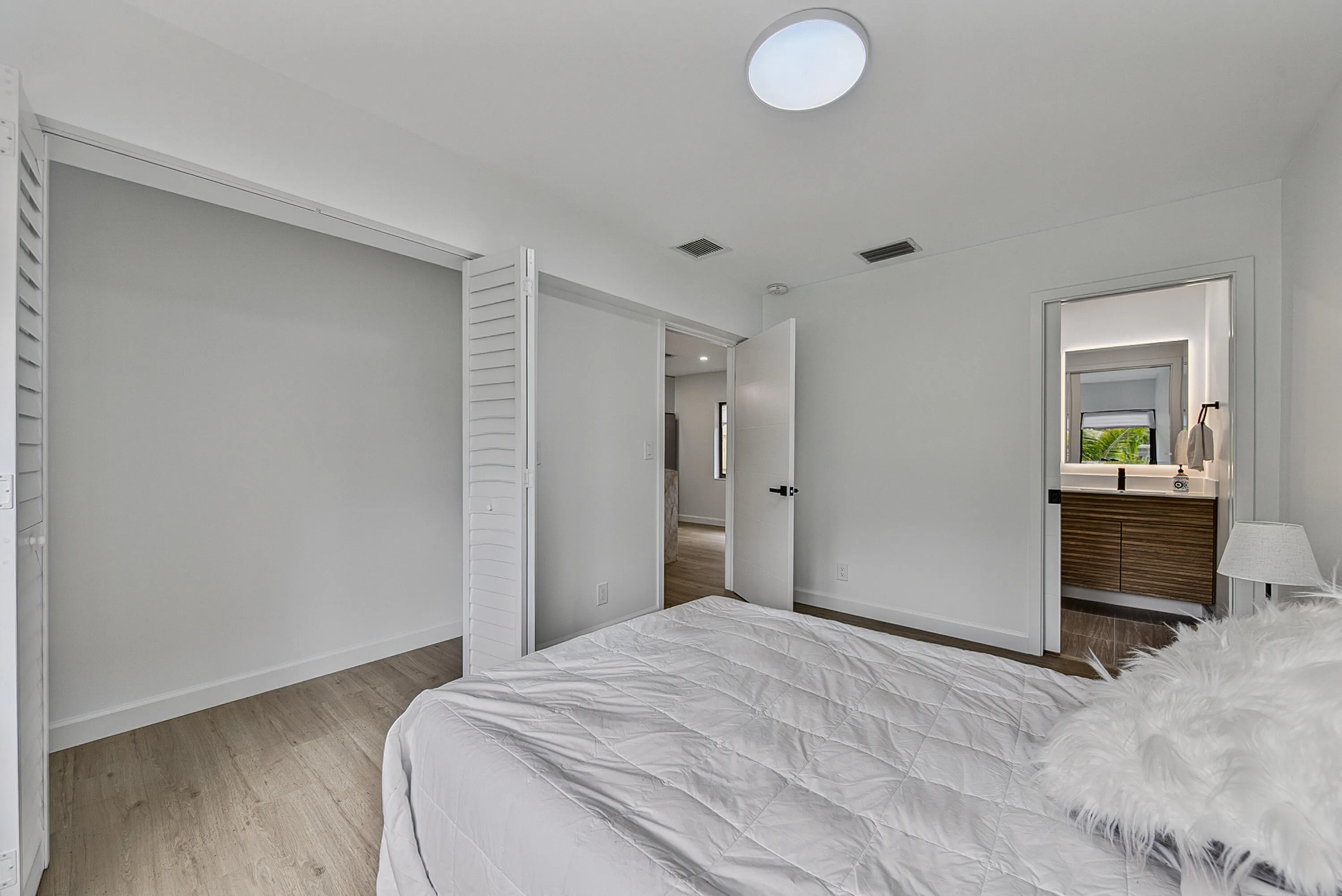 Primary with large closet and fancy en suite bath