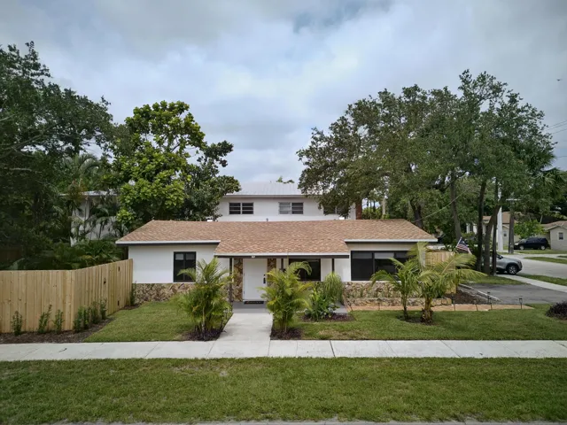 Aerial view front of house and new roof in 2025