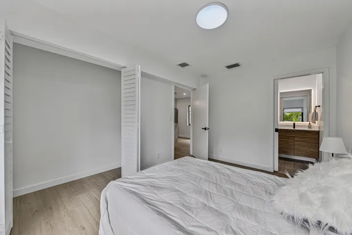 Primary with large closet and fancy en suite bath
