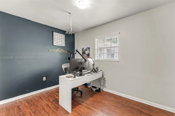 Den currently being used as office. Can be play room.