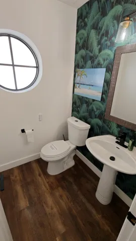 Half bathroom near entrance off livingroom