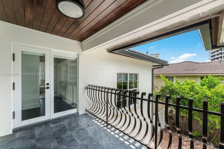 Overlooks pool connects to primary BR, guest BR, Den-office