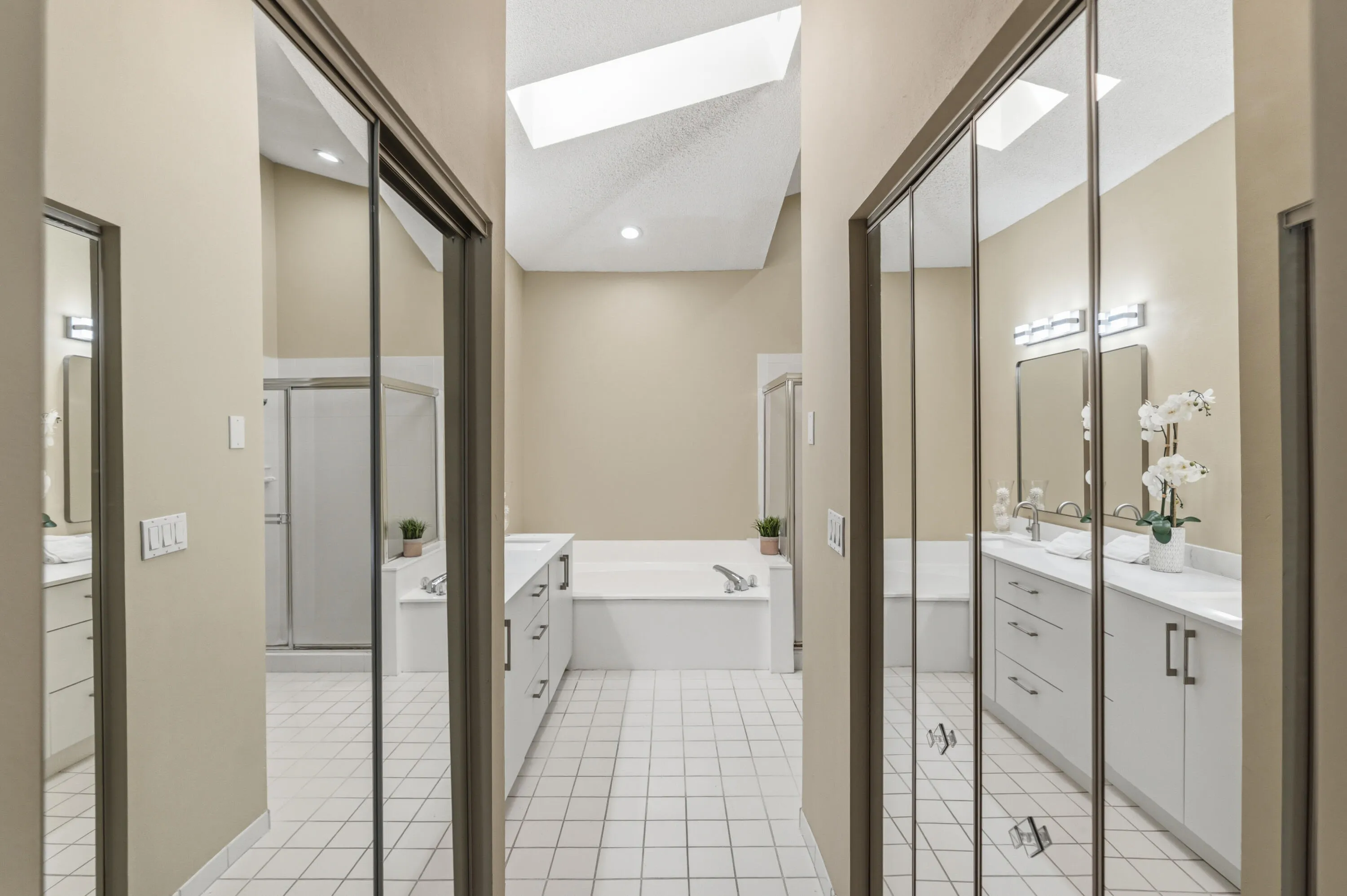 Two closets including a walk-in closet.