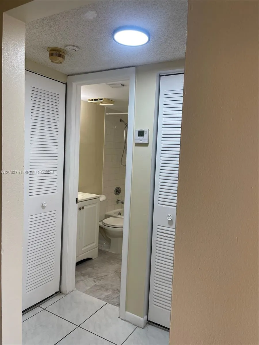 hallway between second bedroom and bathroom