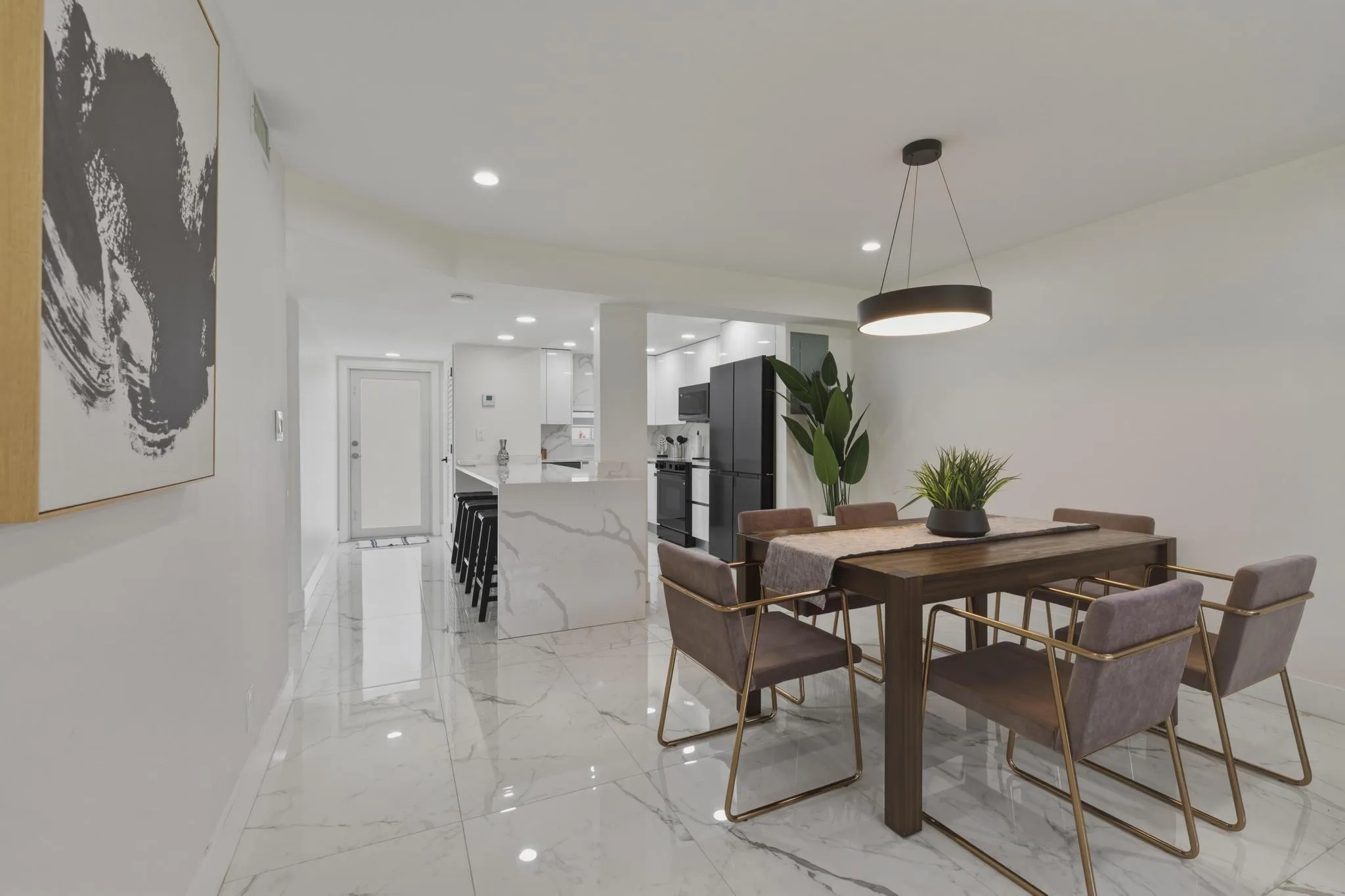 8. Dining Room to Kitchen and Front Door