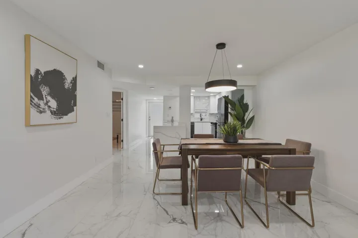 7 B. Dining Room to Kitchen and Foyer