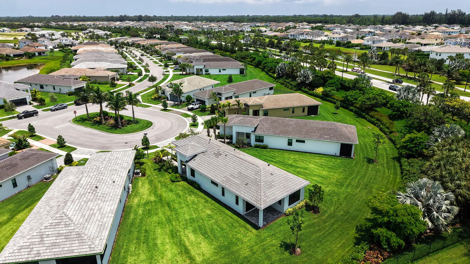 Aerial perspective showcasing a residential community with abundant green spaces