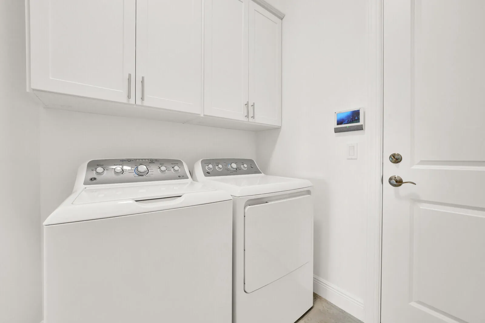 White cabinetry with brushed nickel hardware