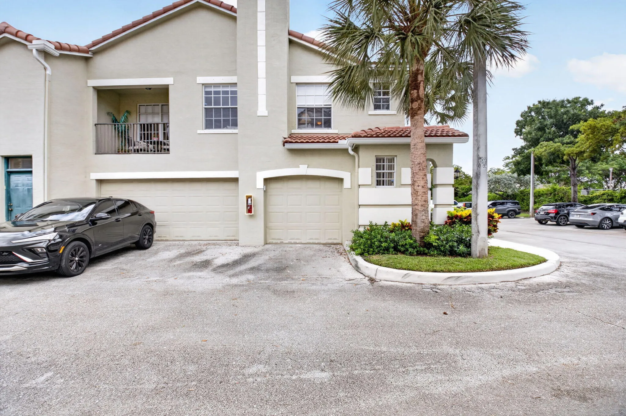 CORNER UNIT WITH PRIVATE 1-CAR GARAGE