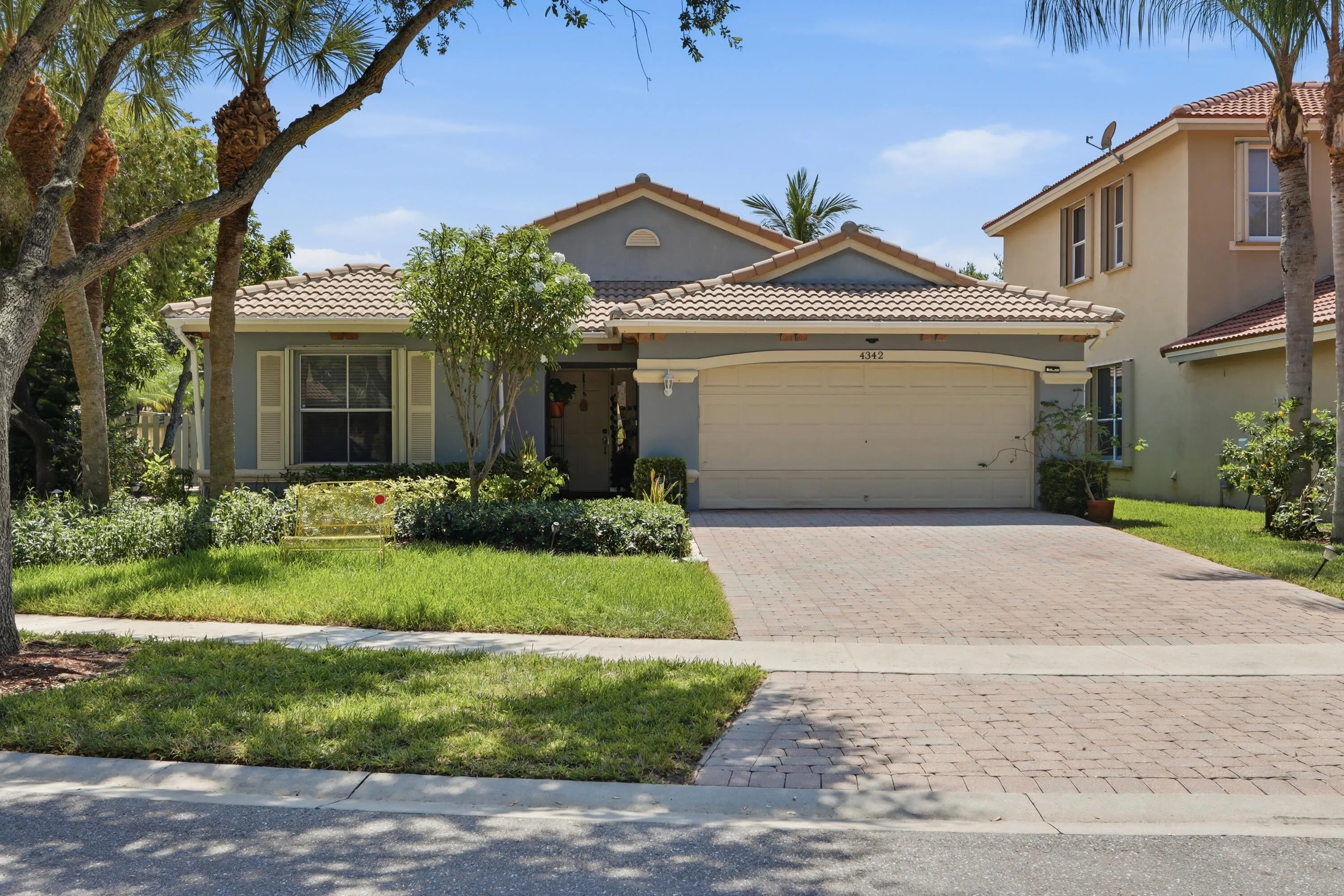 front of house with 2 car garage