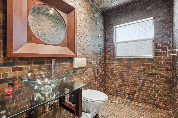 Full bathroom with open walk in shower