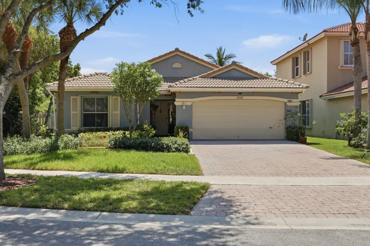 front of house with 2 car garage