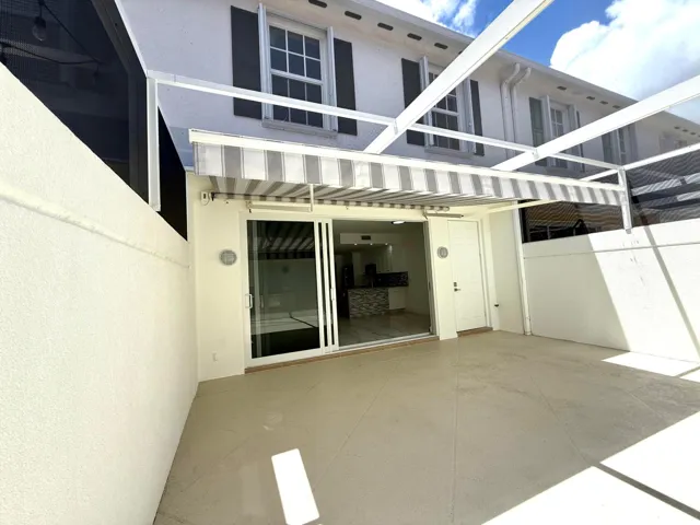 Remote awning to courtyard