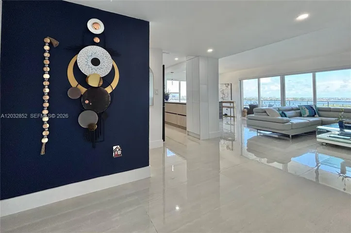 Elegant modern coastal-style entryway featuring artistic ocean-inspired details and an atmosphere of serenity, sophistication, and timeless charm