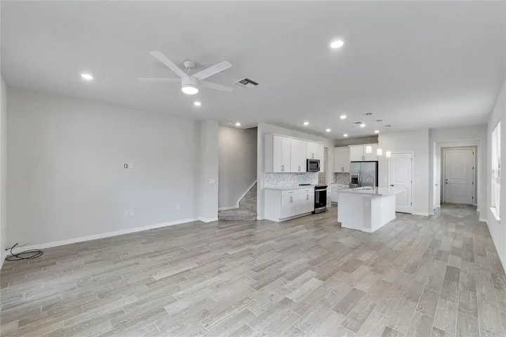 Nice plank tile flooring in Family Room / Kitchen.