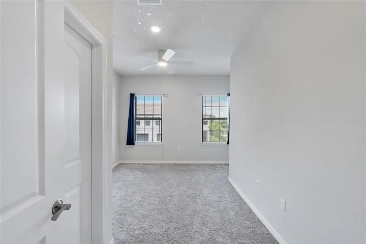 2nd Bedroom lots of natural light & walk-in closet.