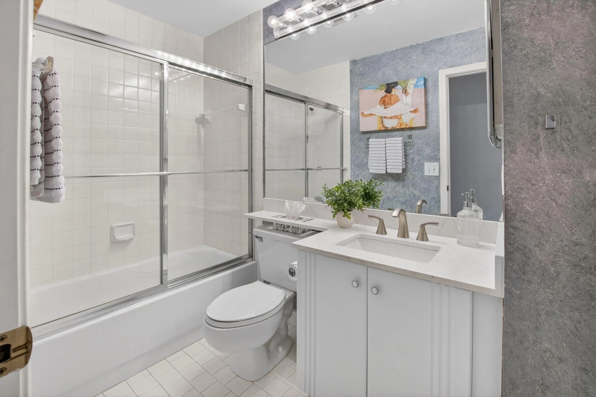 GUEST BATHROOM WITH NEW COUNTERTOP AND FIXTURES