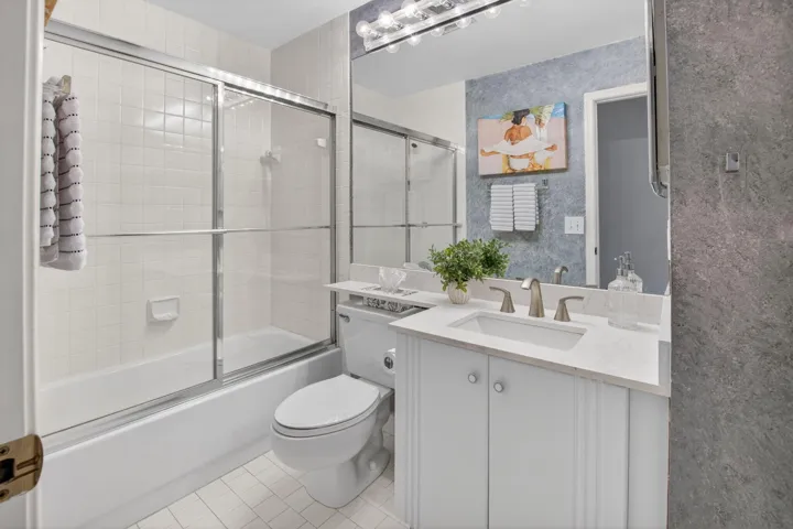 GUEST BATHROOM WITH NEW COUNTERTOP AND FIXTURES