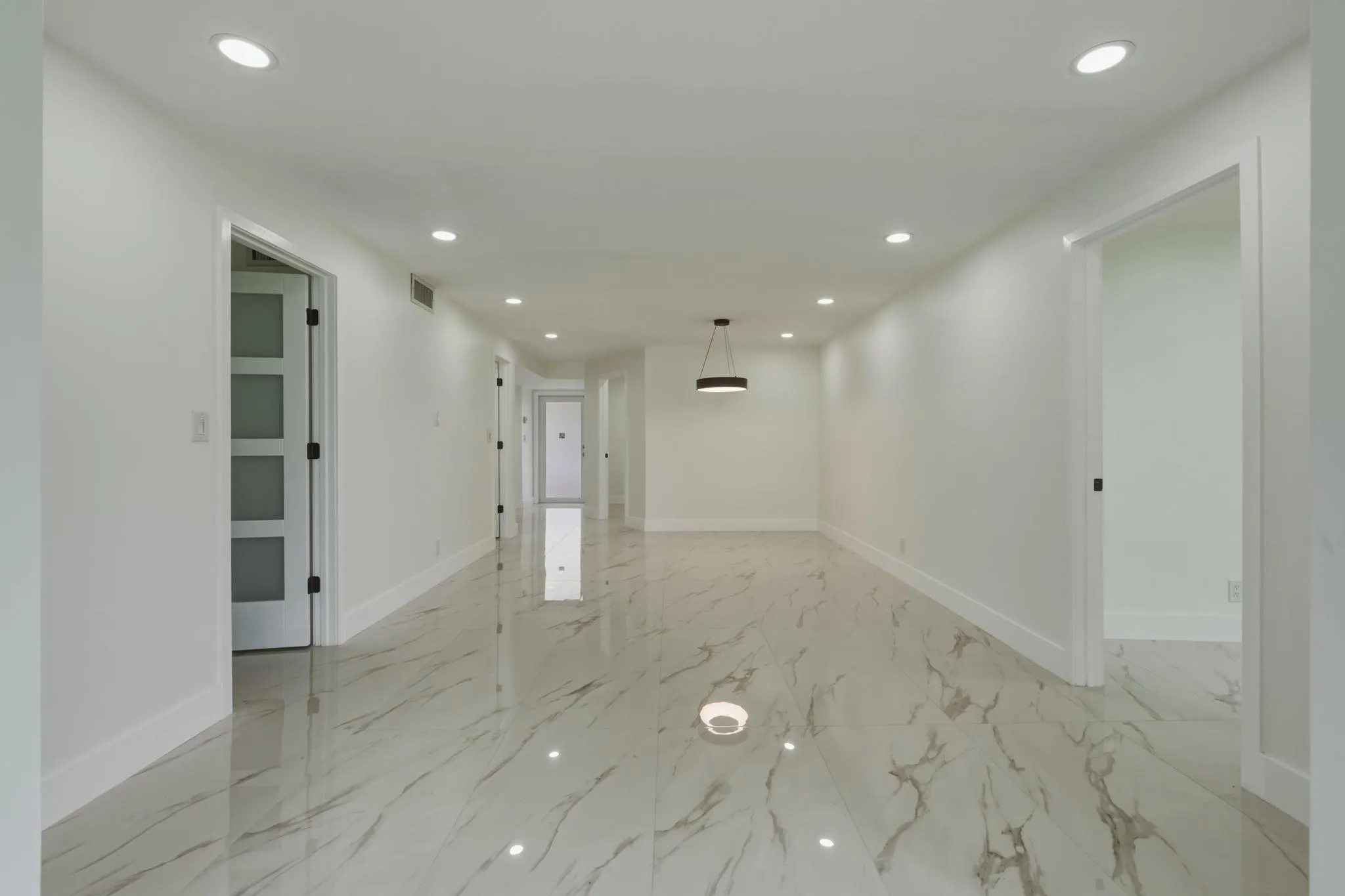 13. Living Room to Foyer