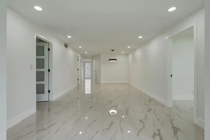 13. Living Room to Foyer